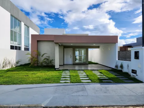 Casa térrea recém-construída à venda em condomínio pé na areia na Barra dos Coqueiros...